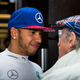 Capture a driver winning the F1 championship. Bonus: Snap the moment he was congratulated by another champion.